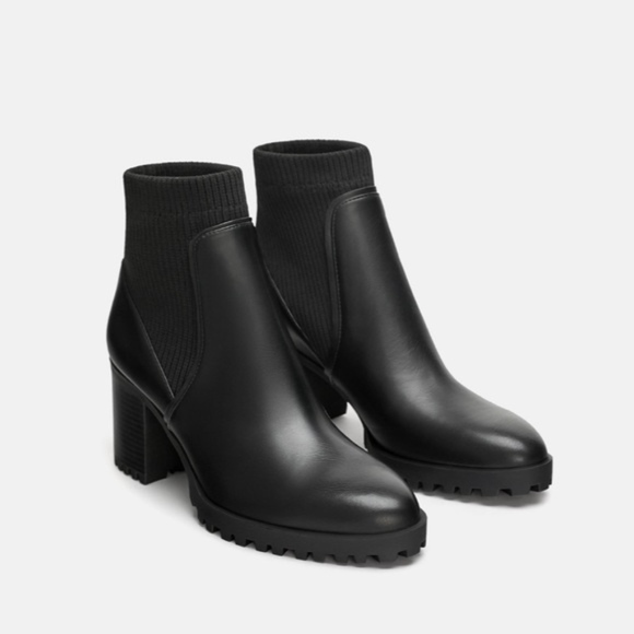 sock style heeled ankle boots with lug soles